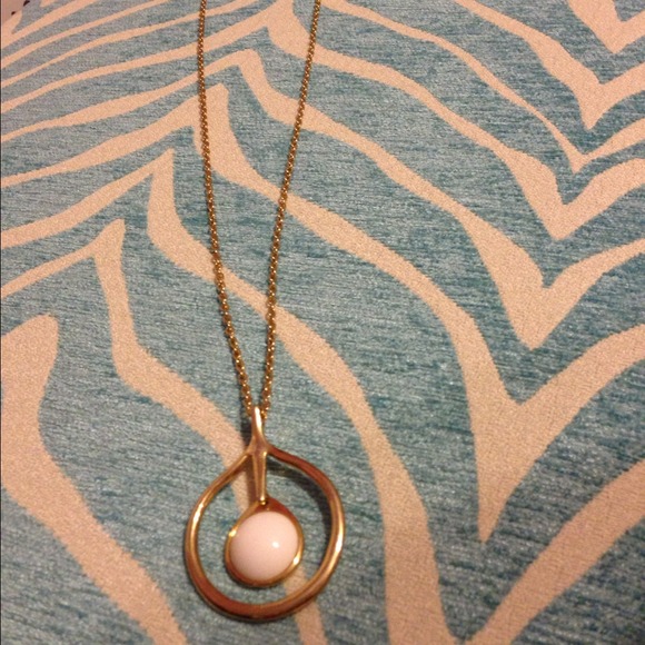 Gold and white necklace