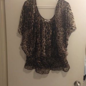 Cheetah print see through top.