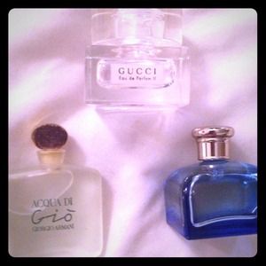 Bundle for @303 of mini perfumes and MK wristlet