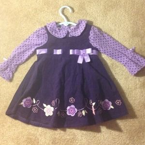 Toddler dress with long sleeve shirt.