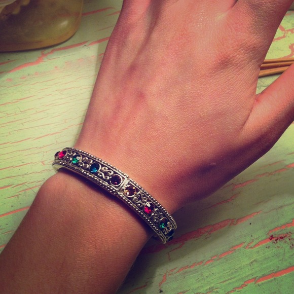 Silver bracelet with multicolored jewels