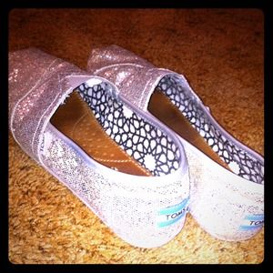TOMS shoes. Worn maybe 3 times. Too big for me.