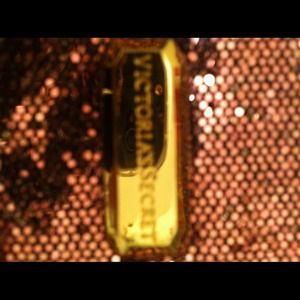 VS pink glittery clutch