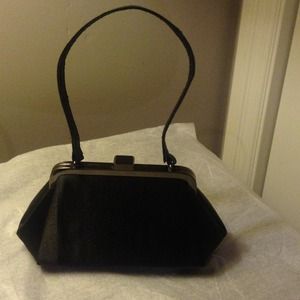 Little black evening bag with handle.