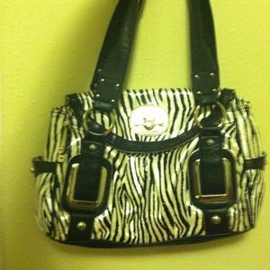 Kathy van Zeeland animal print purse