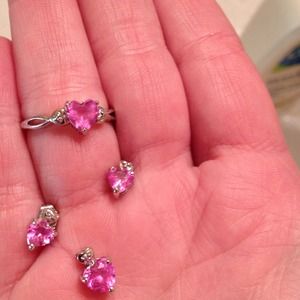 White gold and pink sapphire heart set.