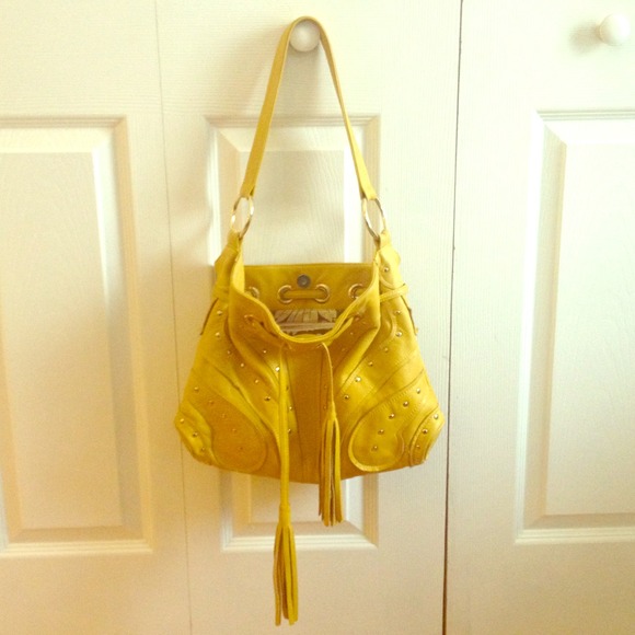 Authentic BULGA handbag. Great color for spring.