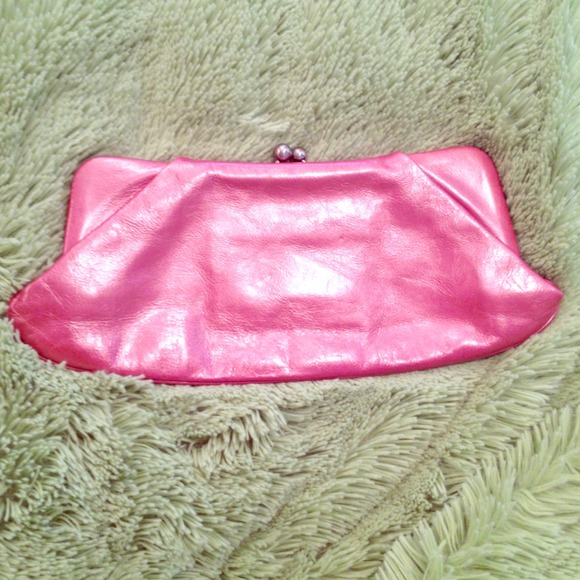 Adorable pink clutch with floral design lining