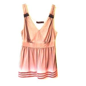 Pink/nude colored top with black mesh overlay