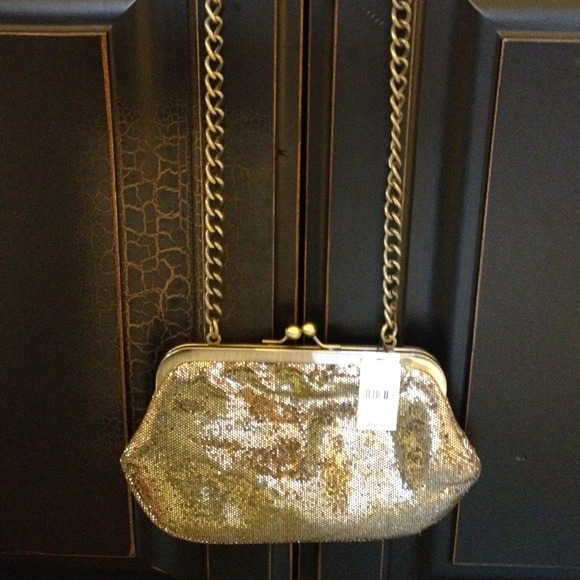 Sold!Golden bronze Express sequin clutch