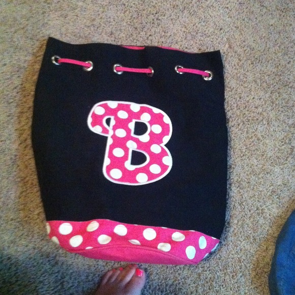 B initial backpack