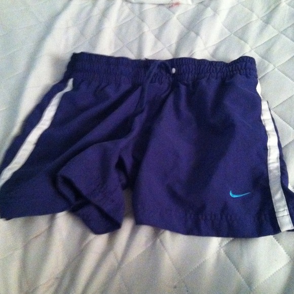 Purple Nike running shorts
