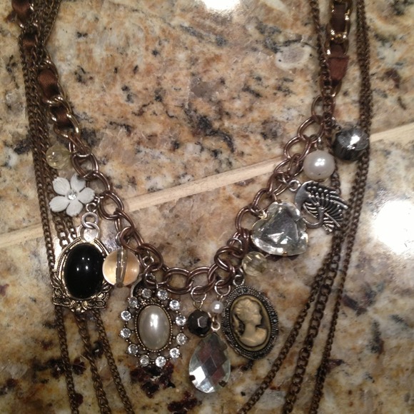 Multi strand charmed necklace