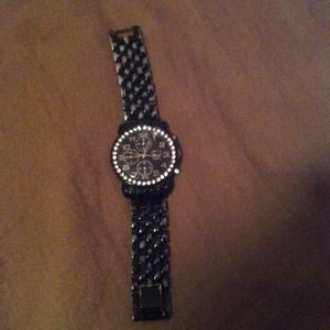 A Macy's brand black watch