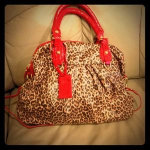 Cheetah print Aldo purse with red trim