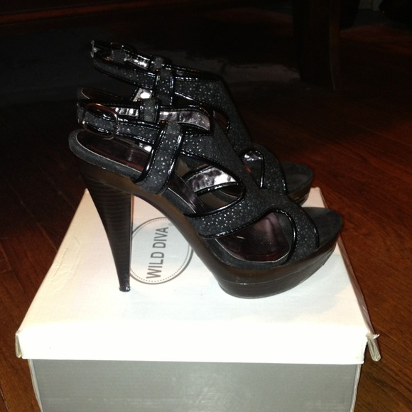 Wild Diva black cutout platform heels.