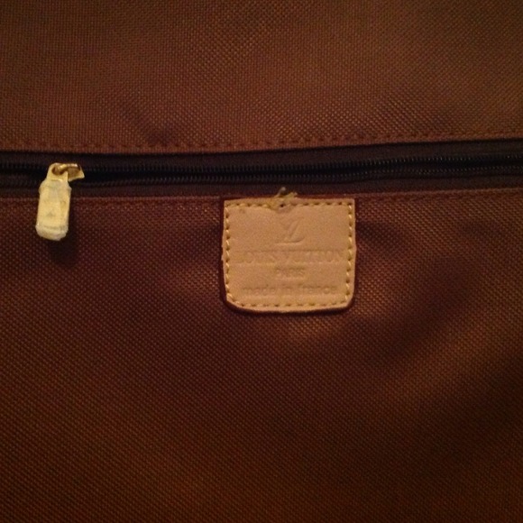 Inside luggage-already in closet & a travel case.