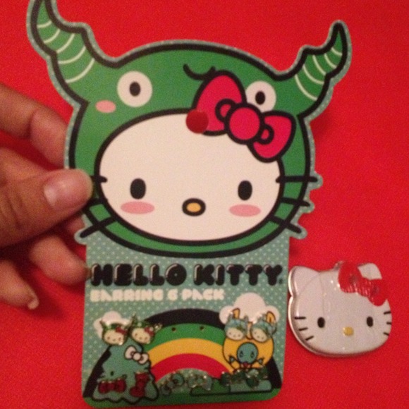Hello Kitty earrings and lipgloss set :D