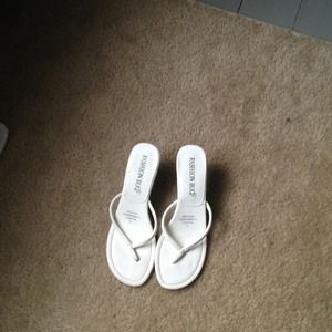 Dressy white kitten heel sandals.