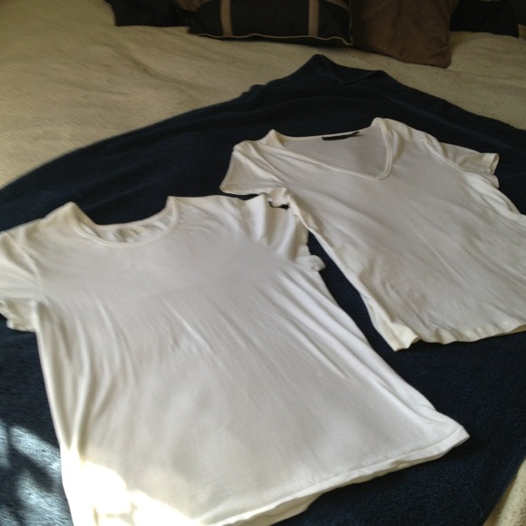 2 white tshirts. One gap xl and one limited large.