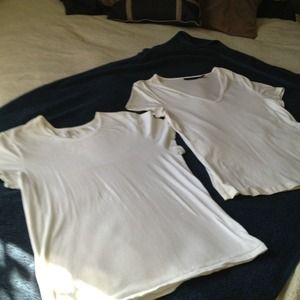 2 white tshirts. One gap xl and one limited large.