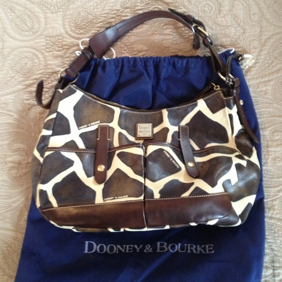 Dooney & Bourke medium safari bag.