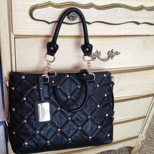 Nice bebe purse.