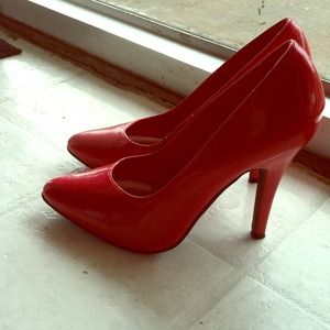 Red heels by Ellie