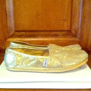Gold TOMS size 8