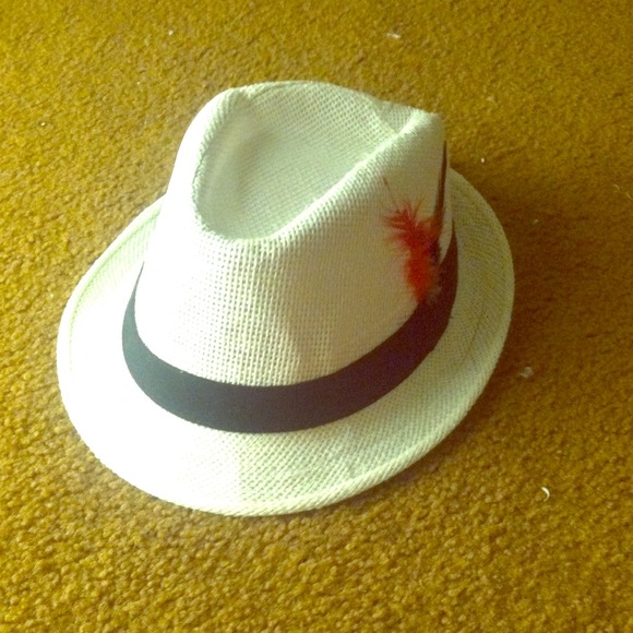 White fedora with feathers