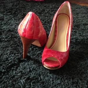 Red peep toe pumps