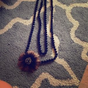 Black necklace with broach