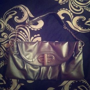 Gray purse. Small. Good for. Night on the town.