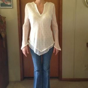 Annie Carson polka dot shirt.