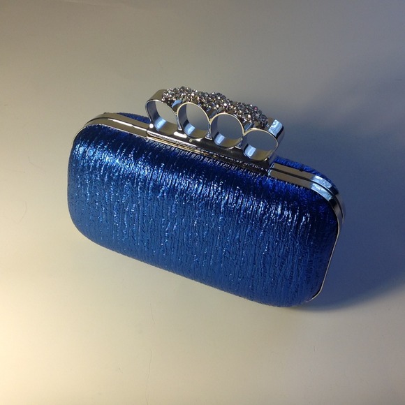 Electric "red carpet" clutch with crystal knuckle
