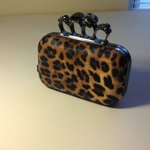 Cheetah print knuckle ring statement clutch
