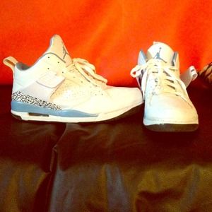 Slightly used white and blue Jordan's