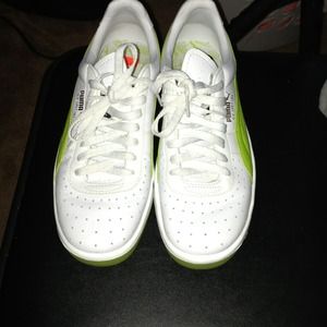 Lime green and white Pumas