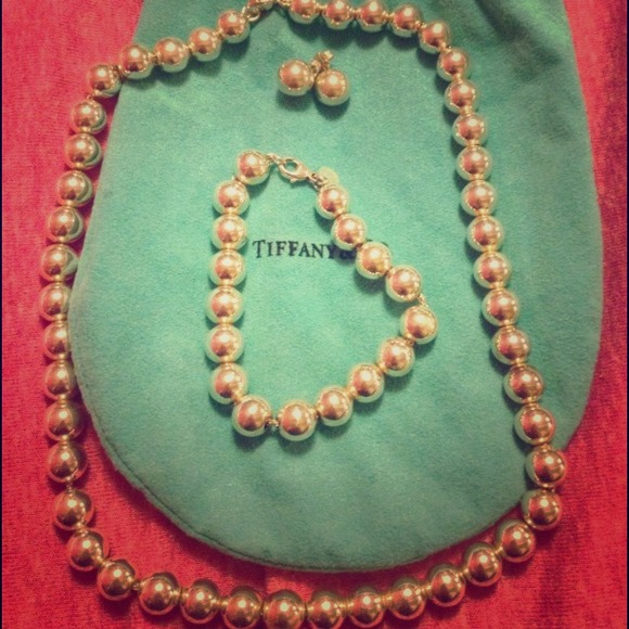 Set of Tiffany necklace, bracelet and earrings.