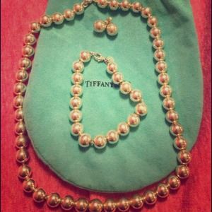 Set of Tiffany necklace, bracelet and earrings.