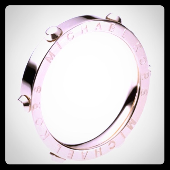 Silver colored MK ring sized 6