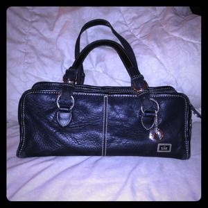 The Sak genuine leather purse.