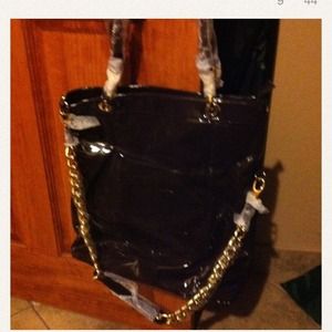 Dress and bag on hold