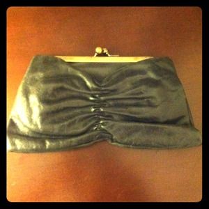 Black leather Hobo International clutch