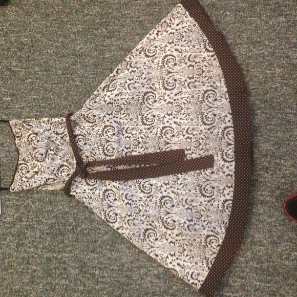 Strapless white dress with brown floral design