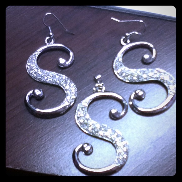Earrings with charm