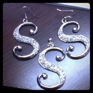 Earrings with charm