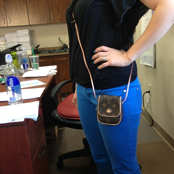 Authentic LV cell phone carrier or small items.