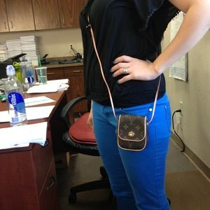 Authentic LV cell phone carrier or small items.