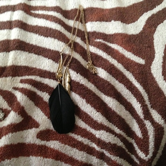 Long gold feather necklace